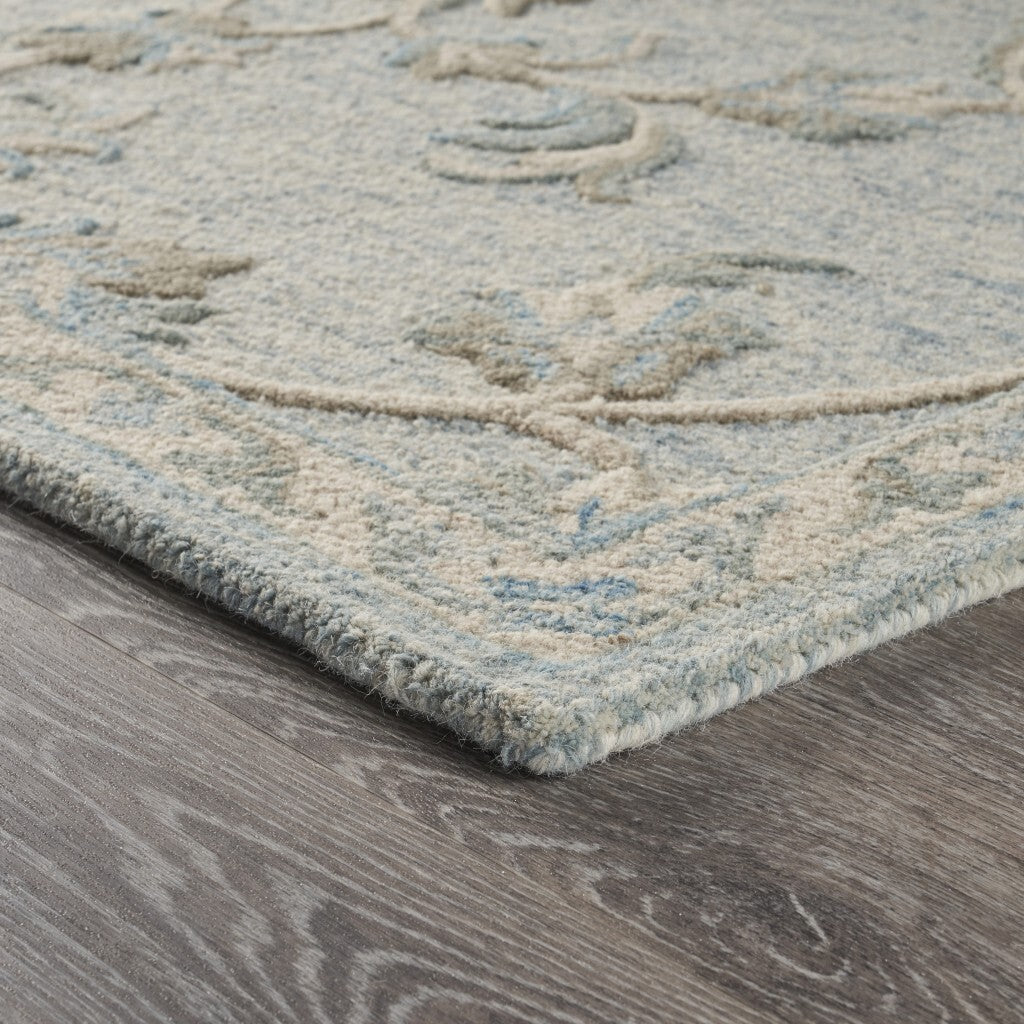 7' x 9' Blue and Cream Filigree Area Rug
