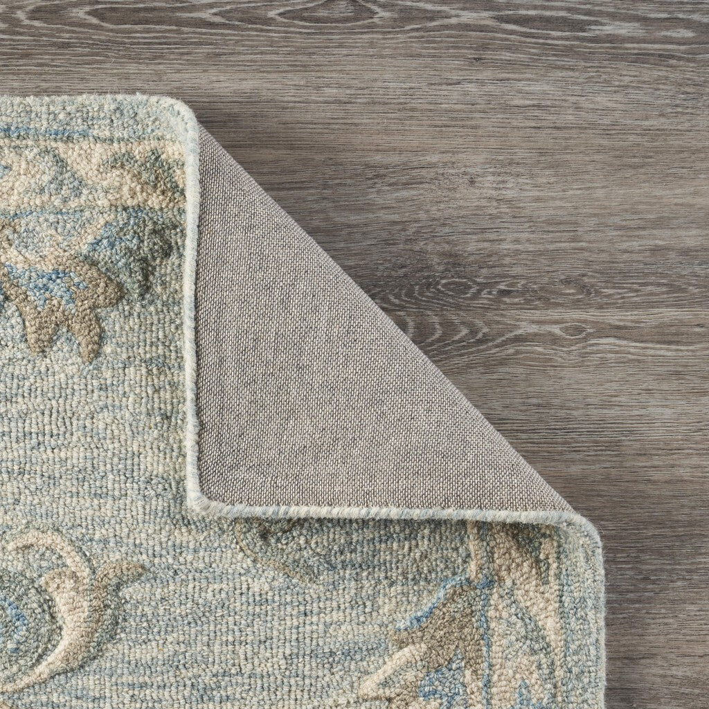 7' x 9' Blue and Cream Filigree Area Rug