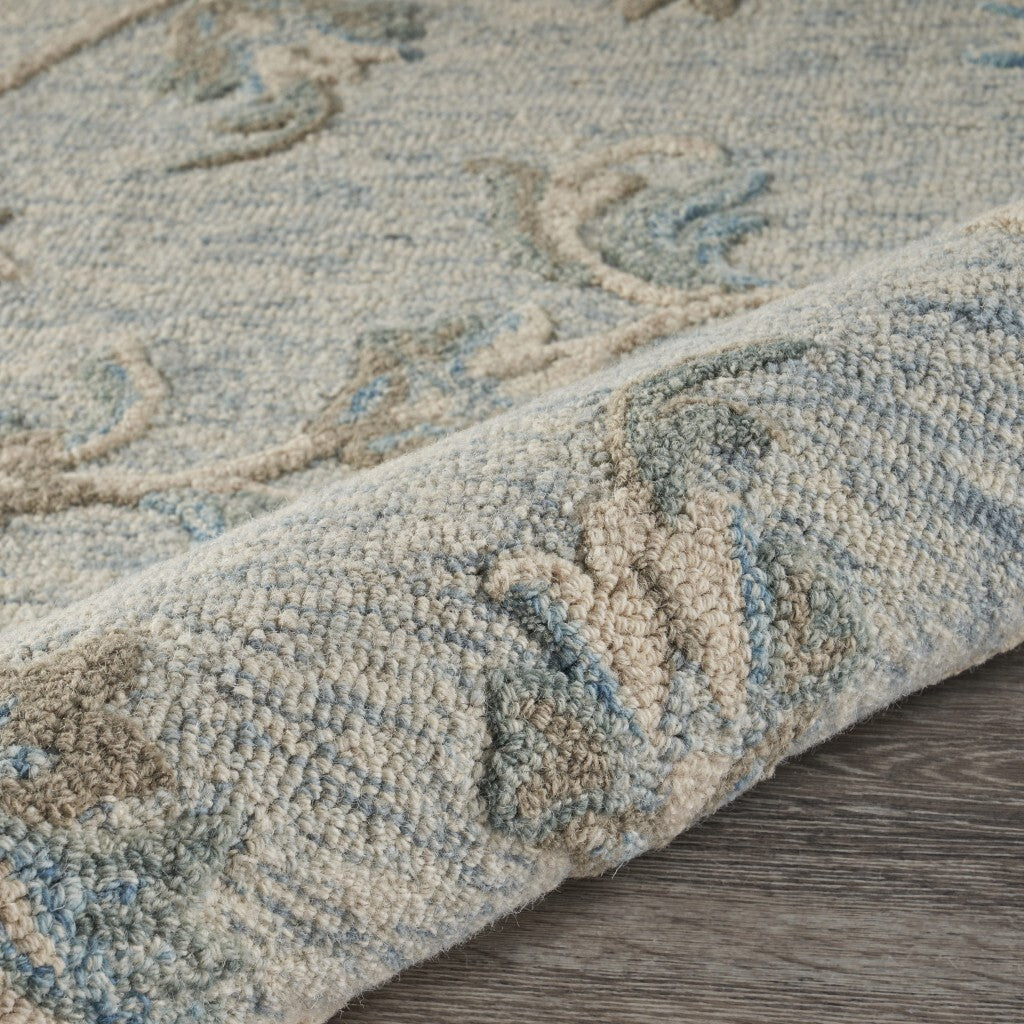 7' x 9' Blue and Cream Filigree Area Rug