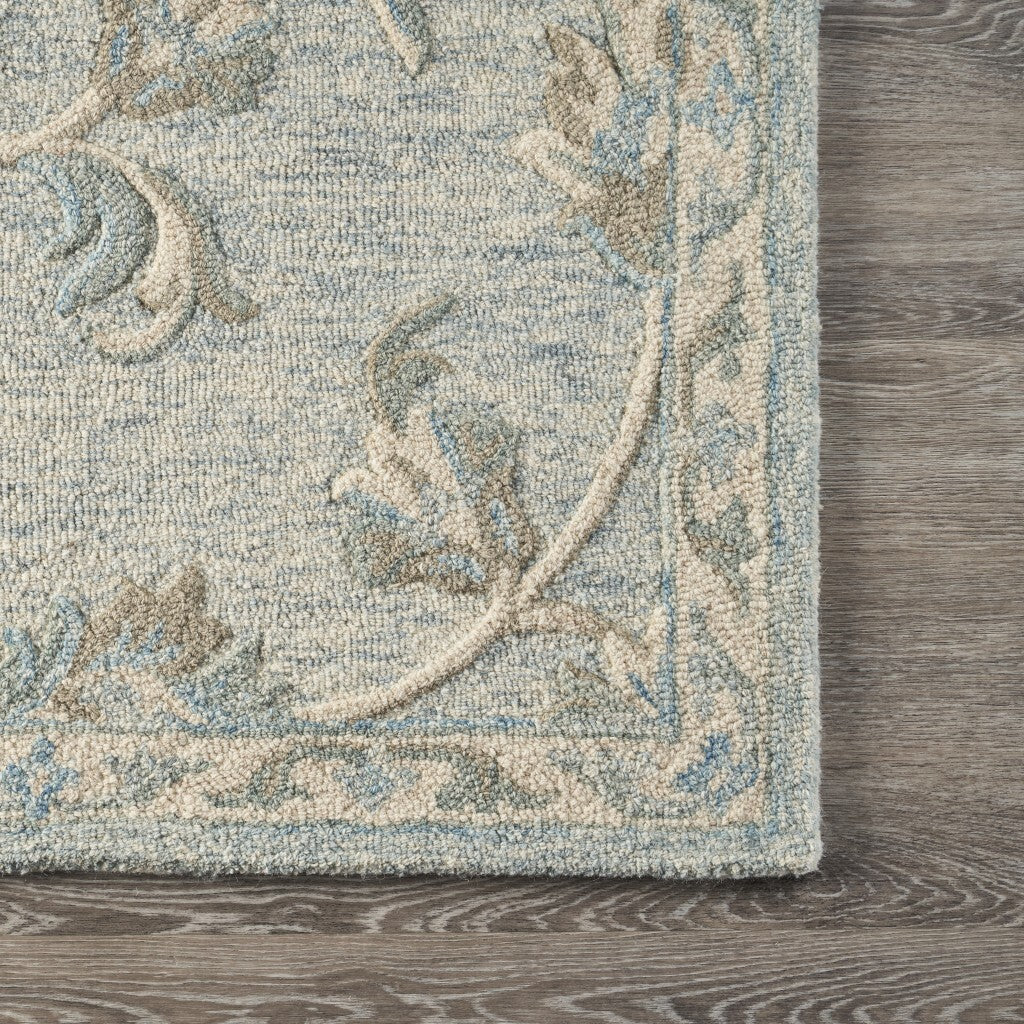 7' x 9' Blue and Cream Filigree Area Rug