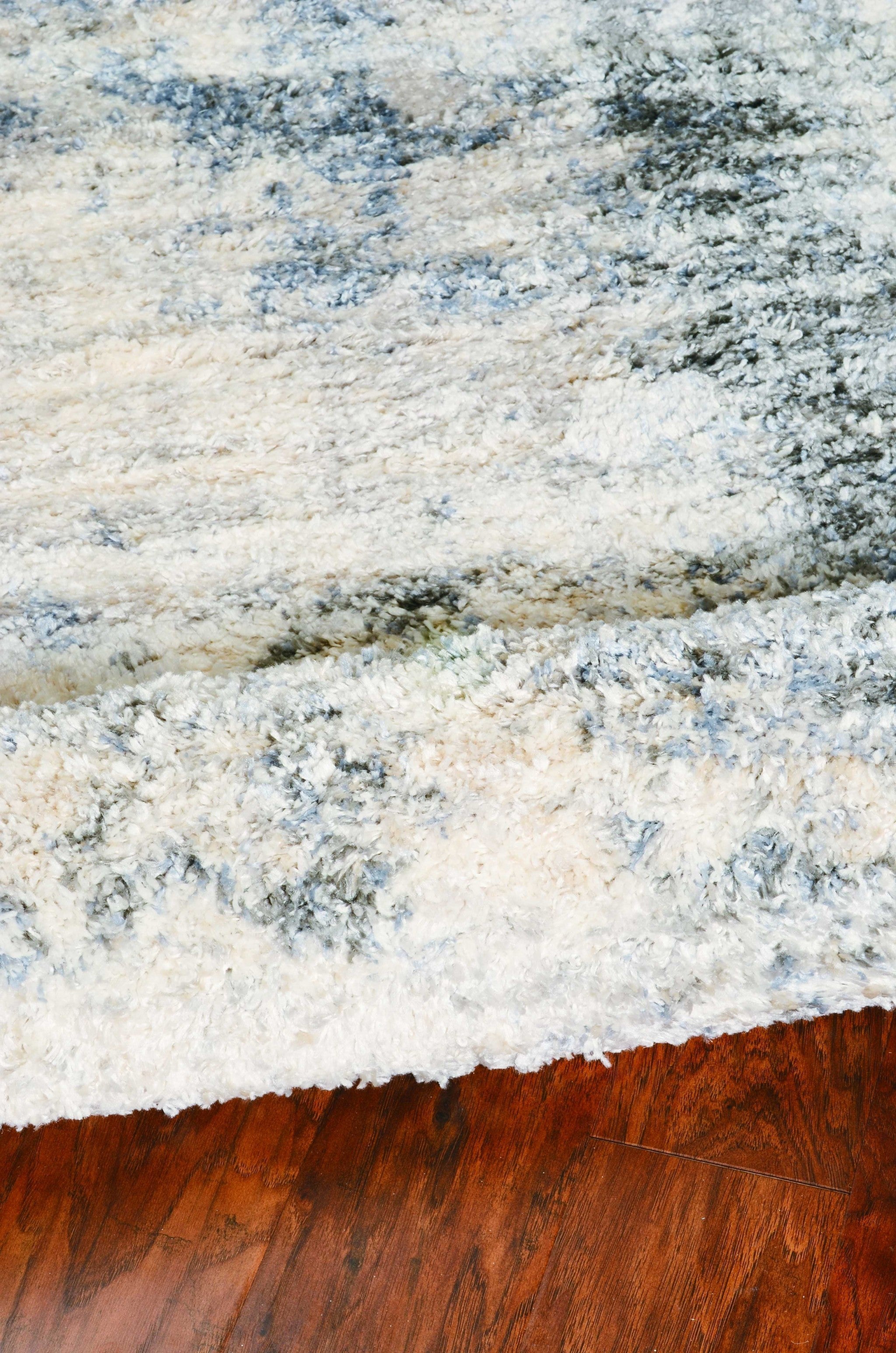 5'X8' Ivory Blue Machine Woven Abstract Indoor Area Rug