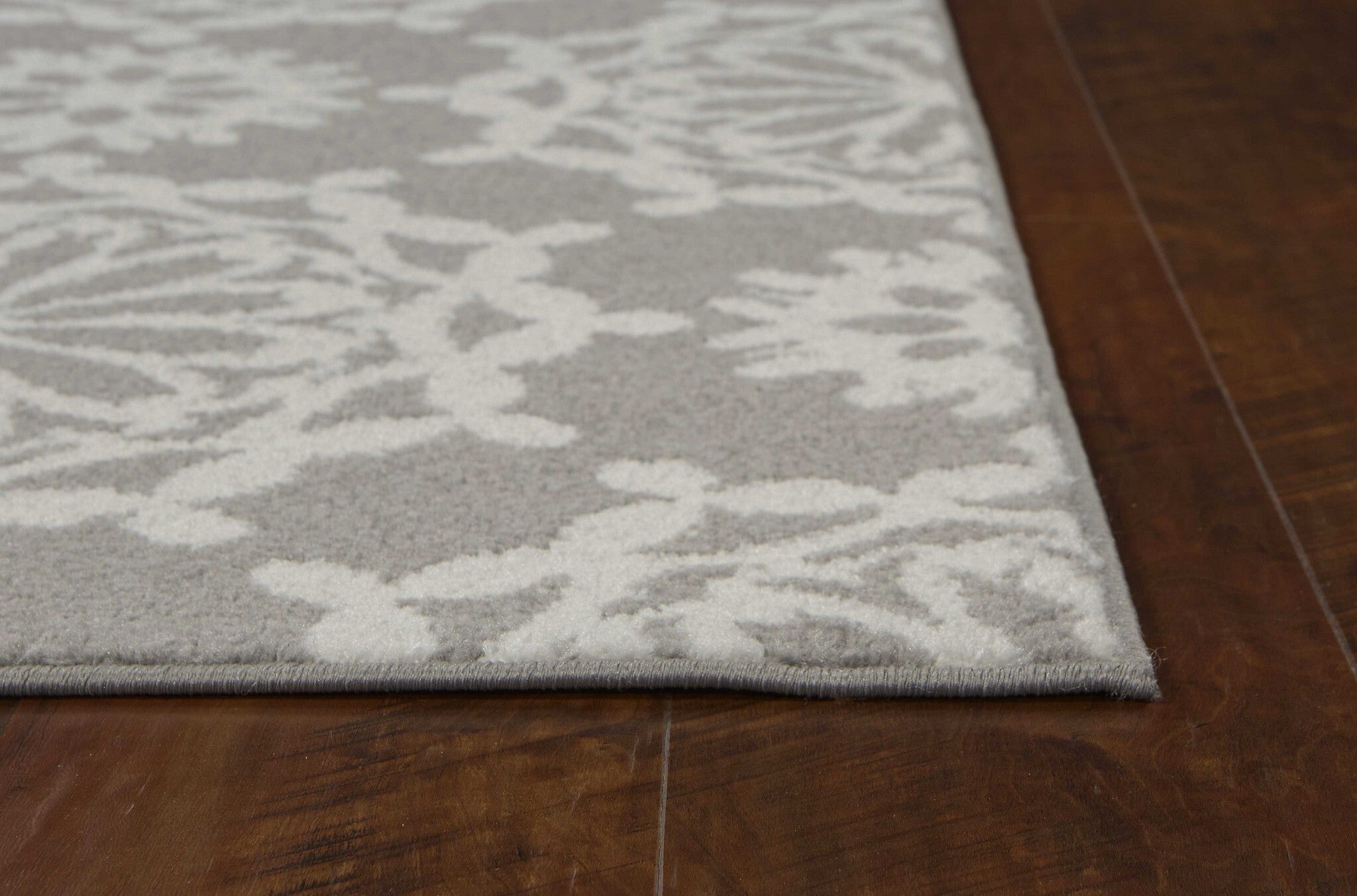 7' Grey Ivory Machine Woven Floral Indoor Runner Rug