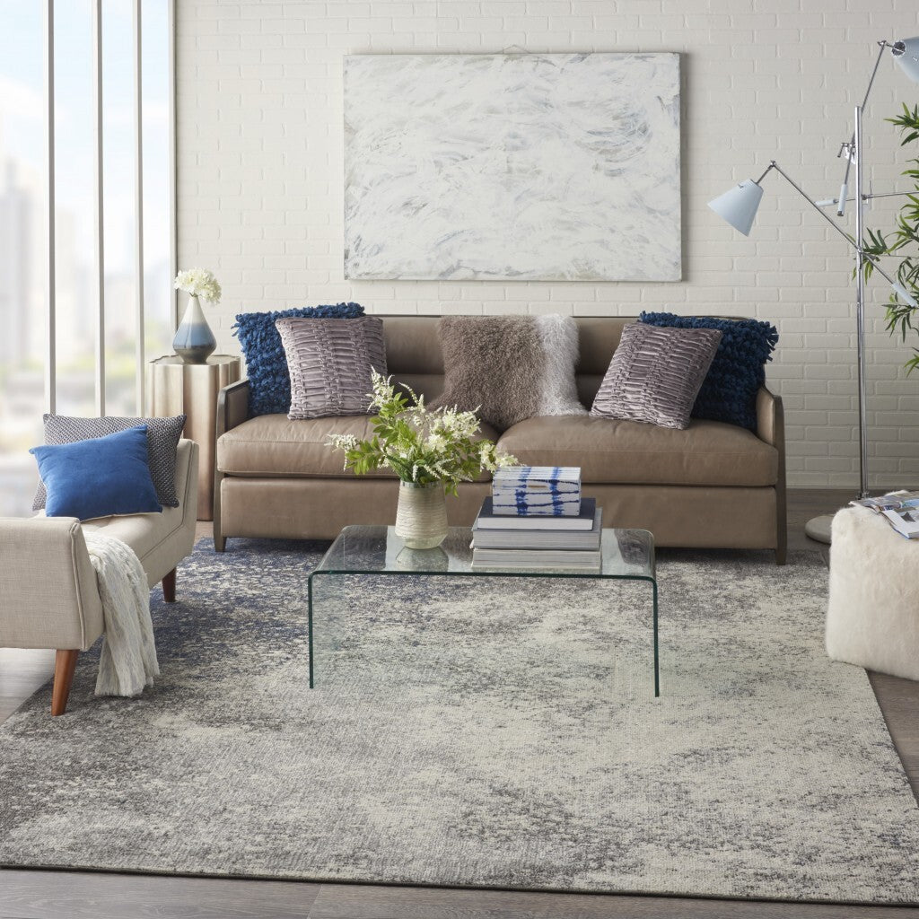 7' X 10' Charcoal And Ivory Abstract Area Rug