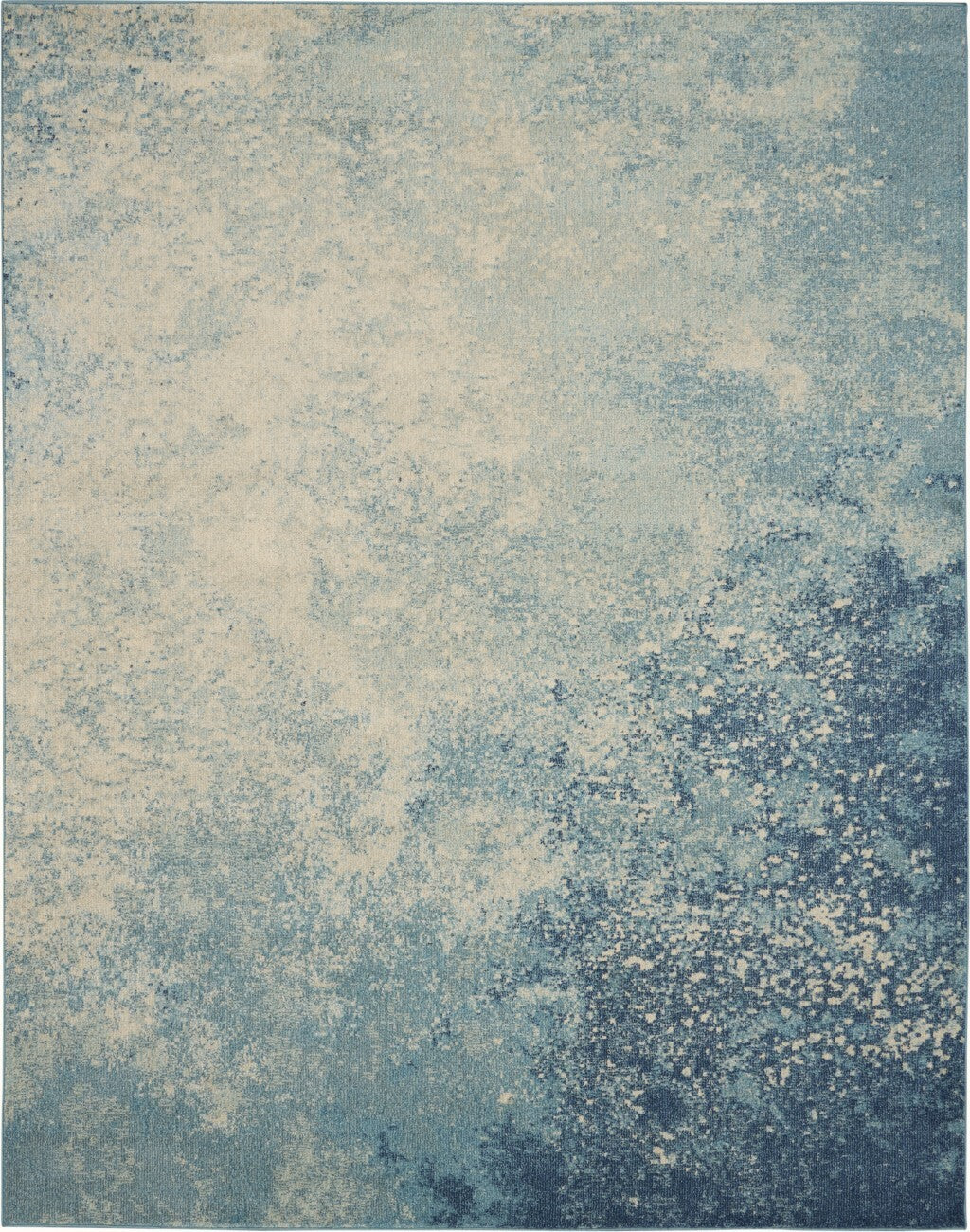 7' X 10' Light Blue And Ivory Abstract Sky Area Rug