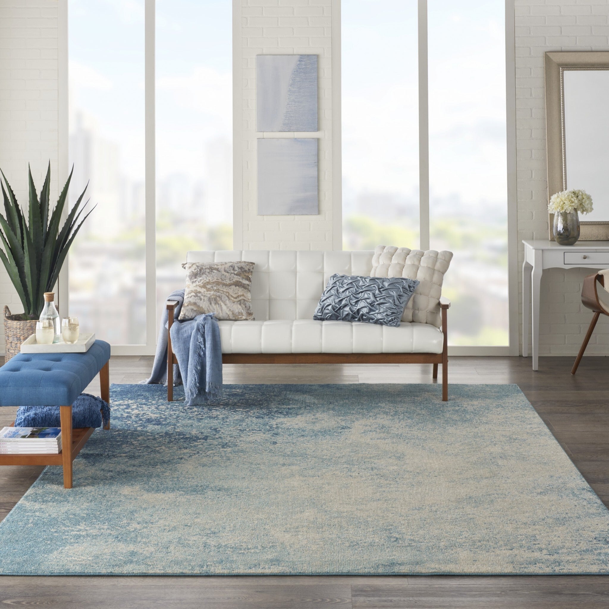 7' X 10' Light Blue And Ivory Abstract Sky Area Rug