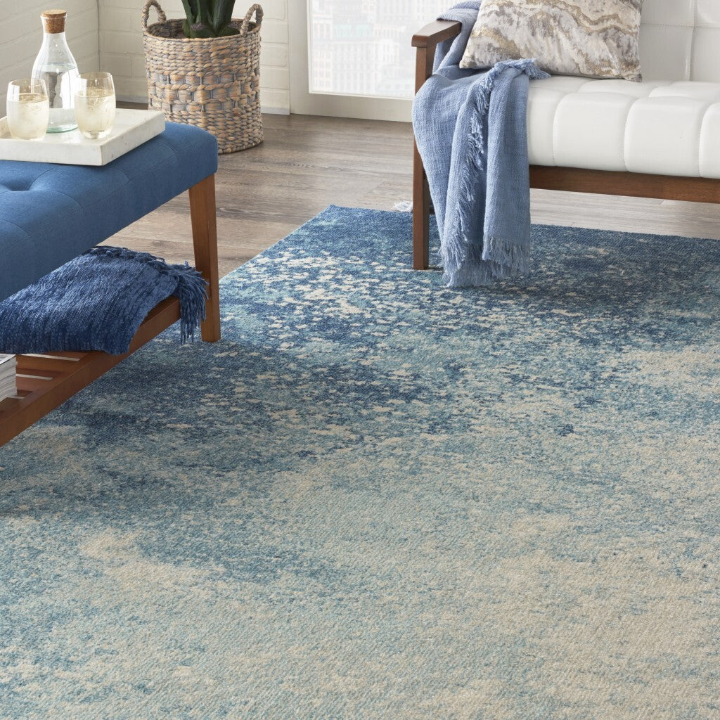 7' X 10' Light Blue And Ivory Abstract Sky Area Rug
