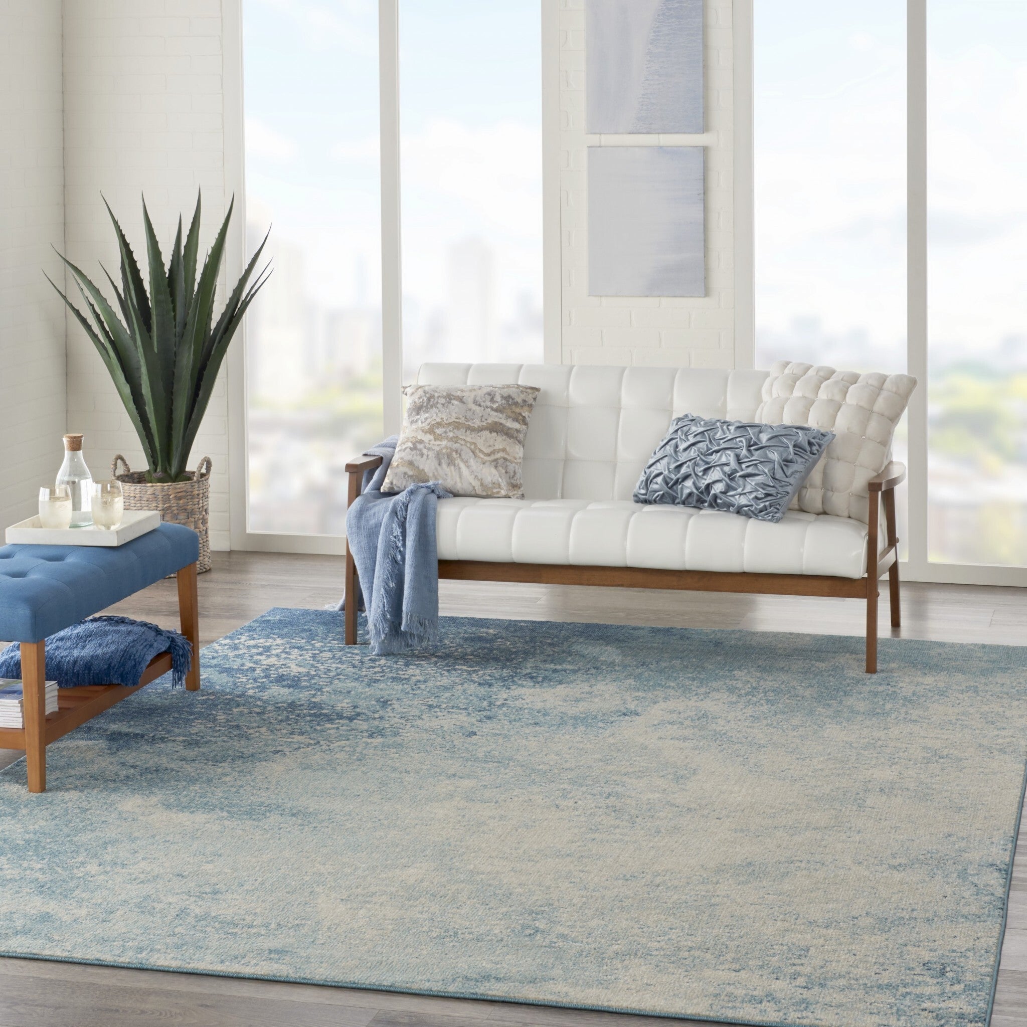 7' X 10' Light Blue And Ivory Abstract Sky Area Rug