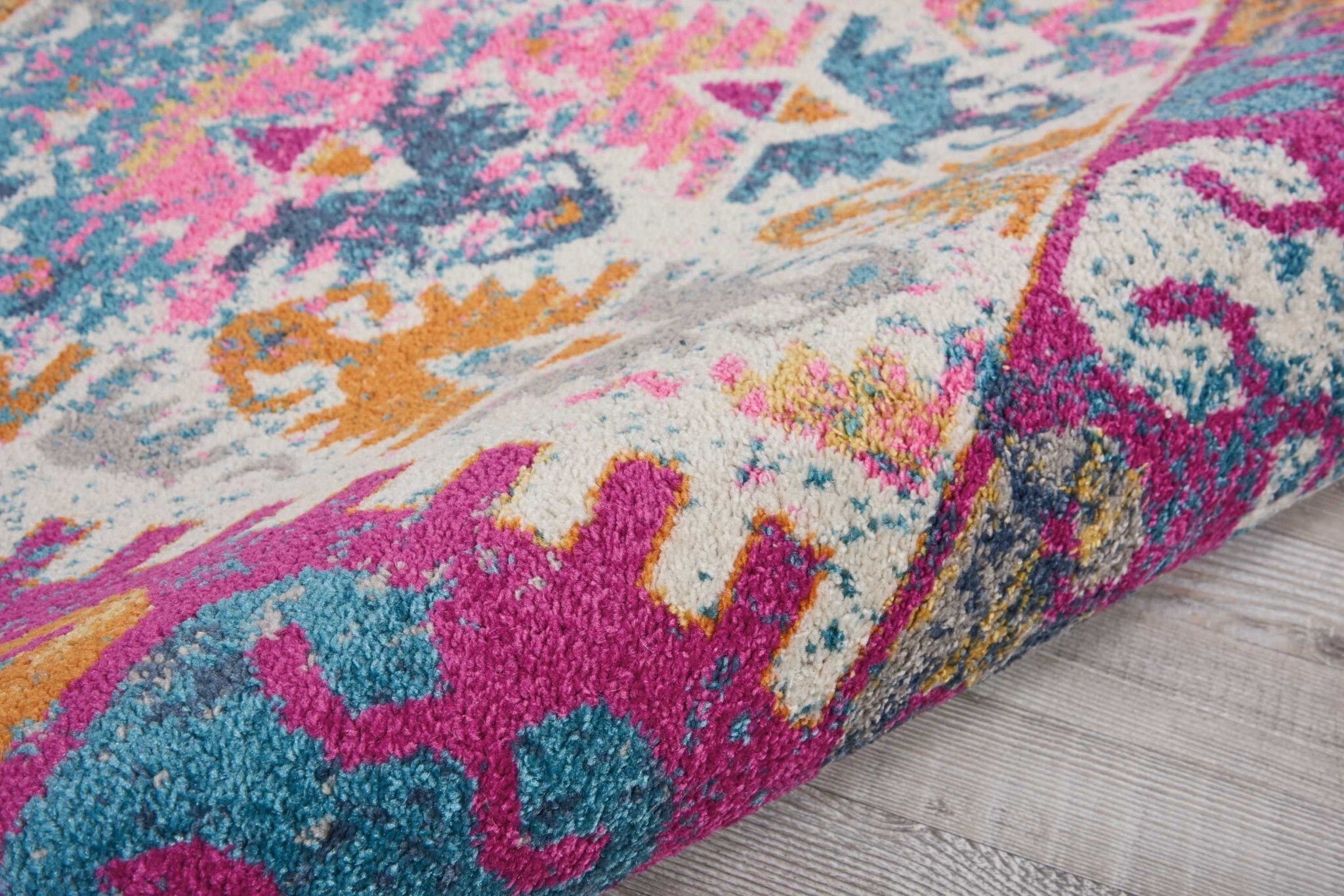 5' X 7' Ivory And Magenta Tribal Pattern Area Rug