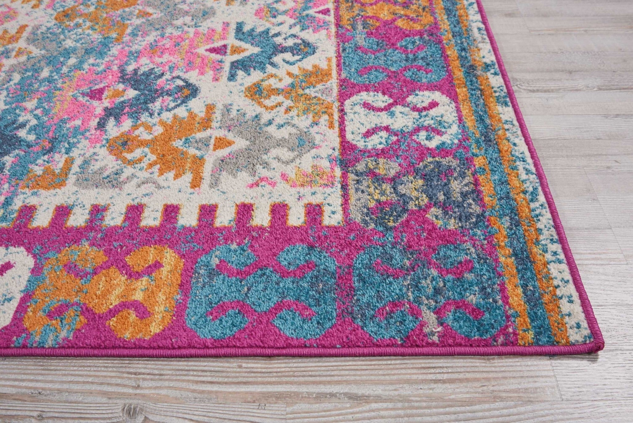 5' X 7' Ivory And Magenta Tribal Pattern Area Rug