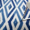 6' X 9' Ivory And Blue Diamond Area Rug