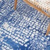 5' X 7' Ivory And Navy Abstract Grids Area Rug