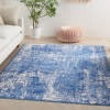 6' X 9' Blue And Ivory Abstract Splash Area Rug