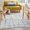 5' X 7' Ivory And Blue Irregular Grids Area Rug