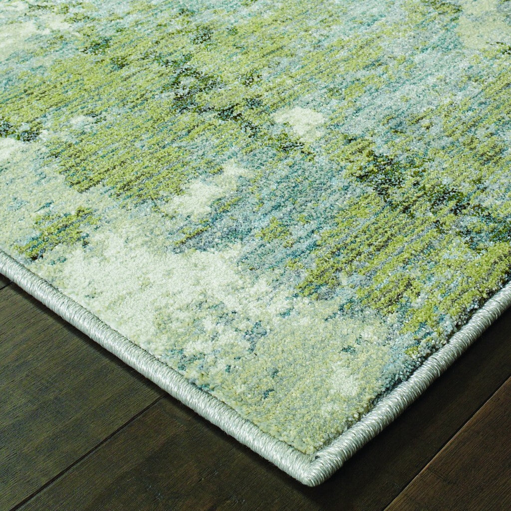7' X 10' Blue And Sage Distressed Waves Indoor Area Rug