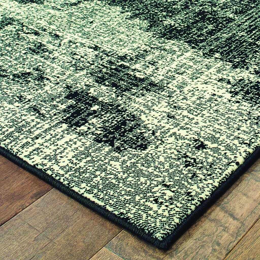 3' X 6' Black Ivory Machine Woven Abstract Indoor Area Rug