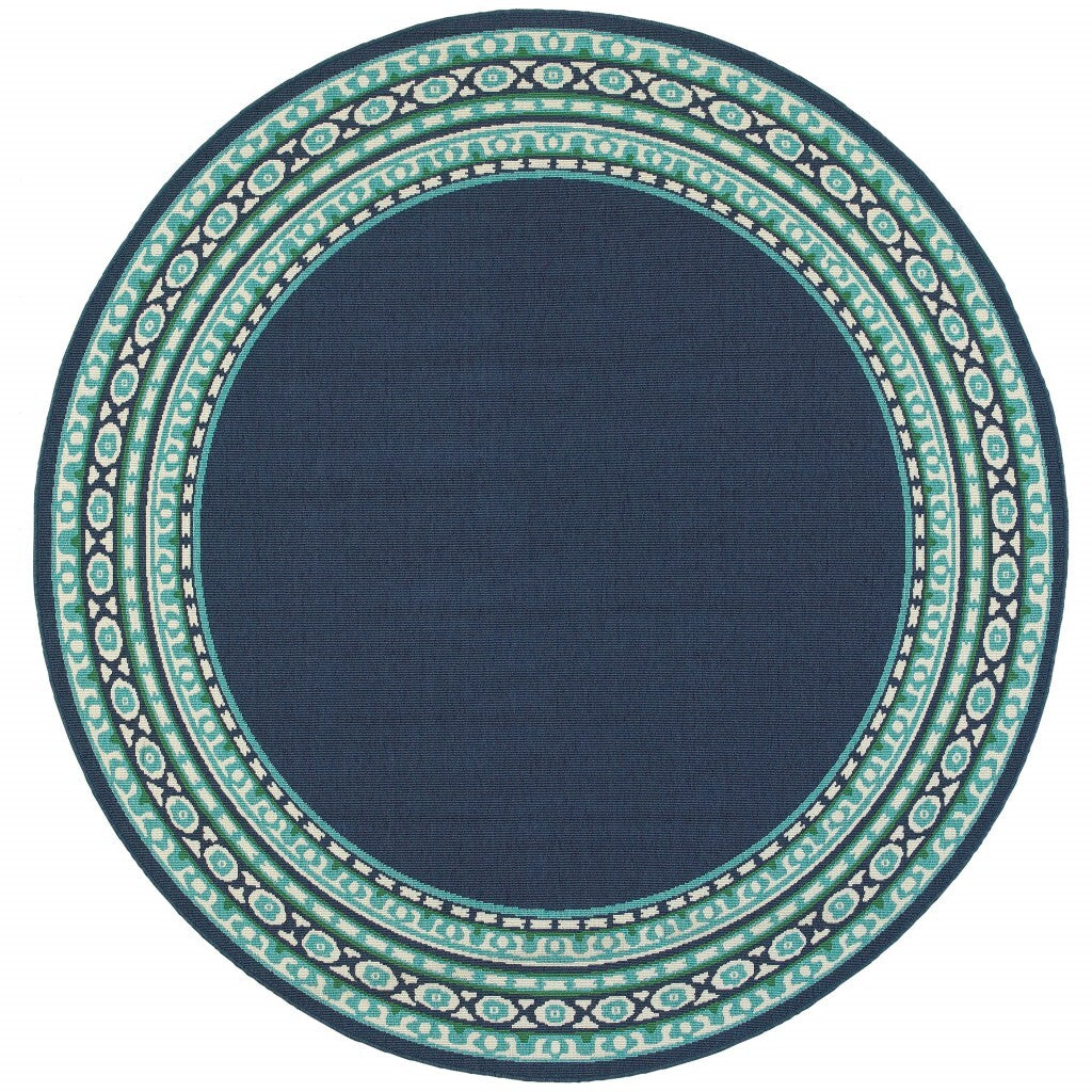 8' Round Navy And Green Geometric Indoor Outdoor Area Rug