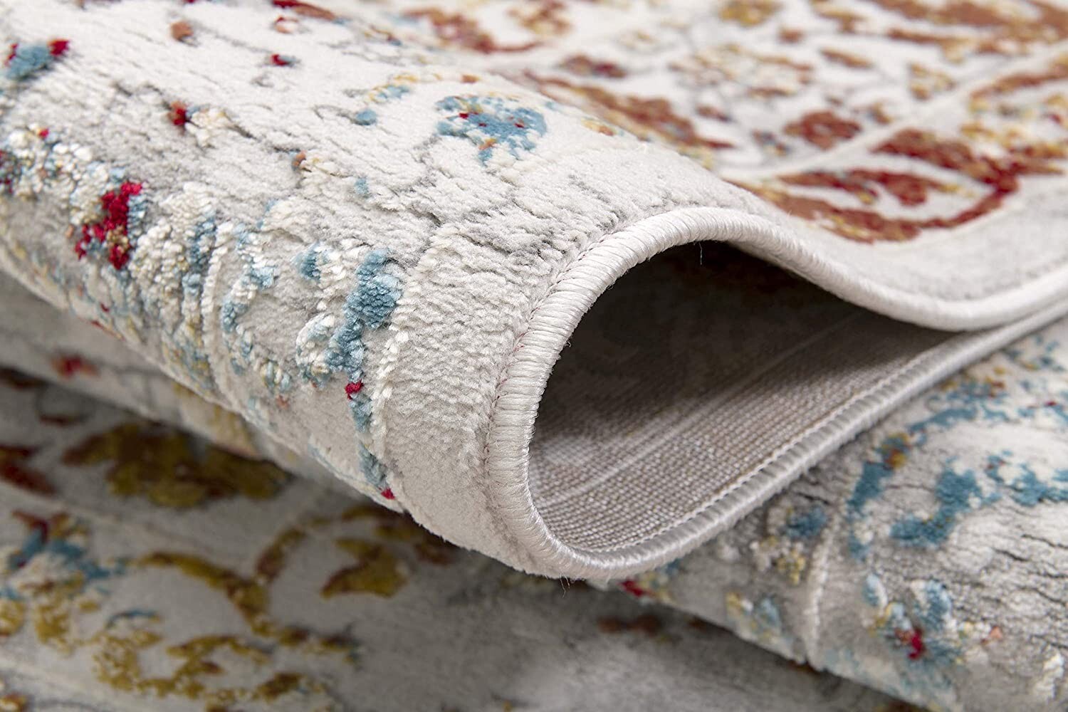 5' X 8' Gray And Beige Distressed Ornate Area Rug