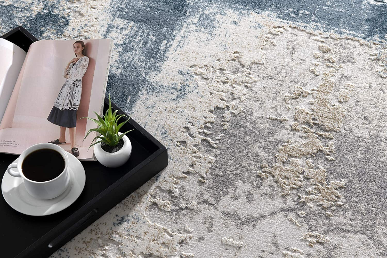 7' X 10' Cream And Blue Abstract Patches Area Rug