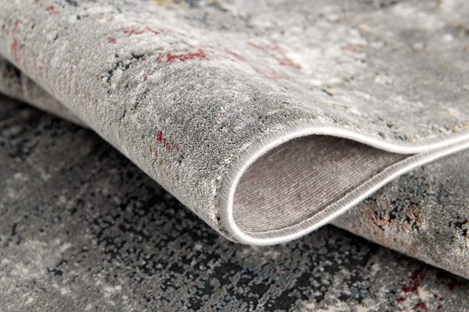 7' X 10' Gray And Ivory Abstract Area Rug