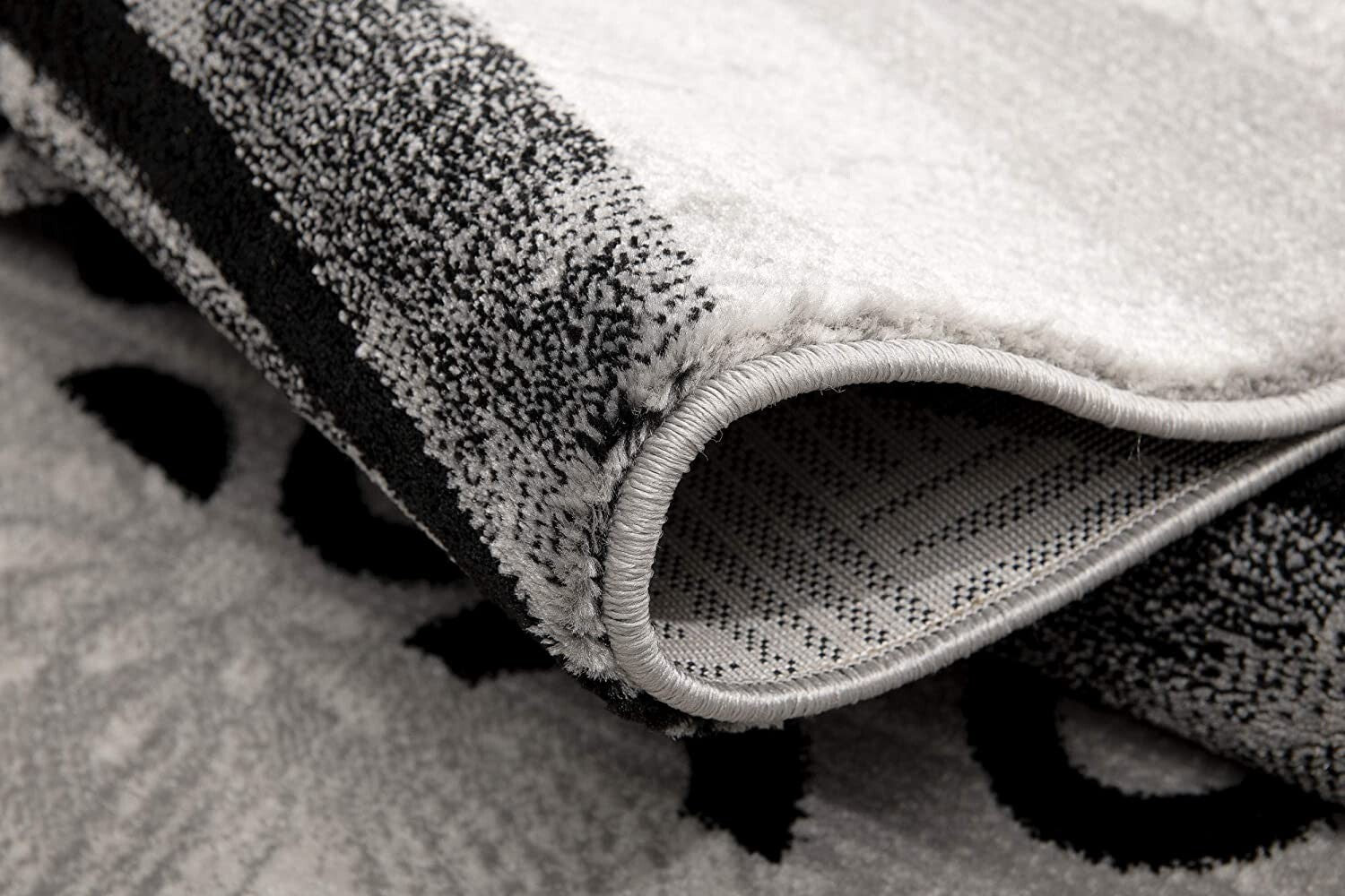 5' X 8' Gray And Black Abstract Waves Area Rug