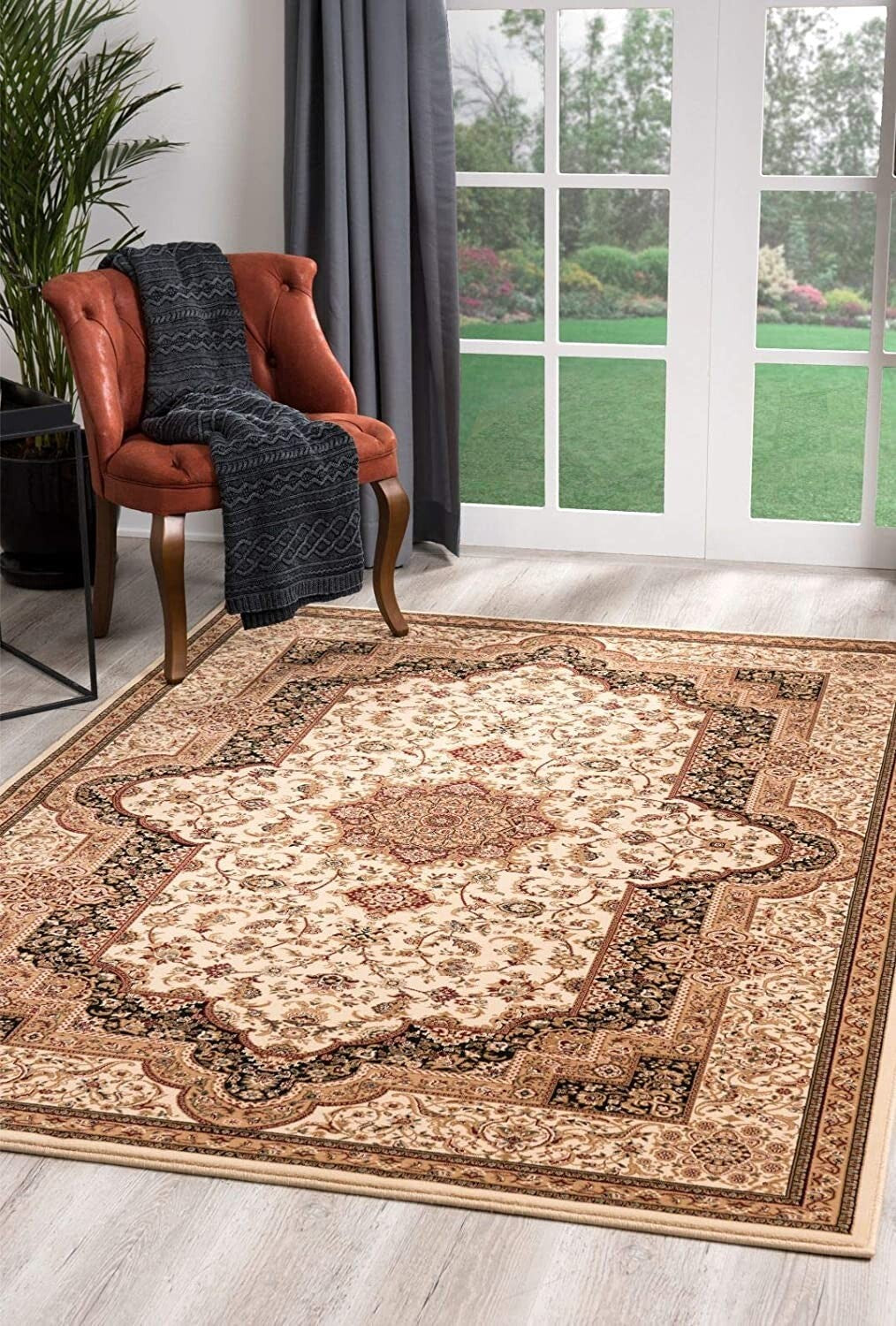 5' x 8' Cream and Black Decorative Area Rug