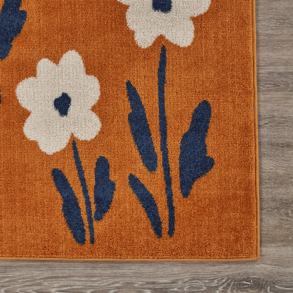5' x 7' Orange and Ivory Flower Field Area Rug