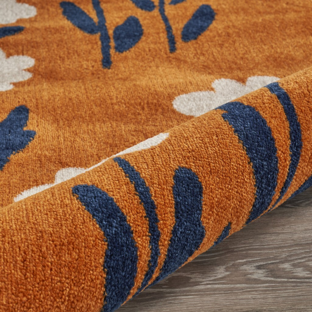 5' x 7' Orange and Ivory Flower Field Area Rug