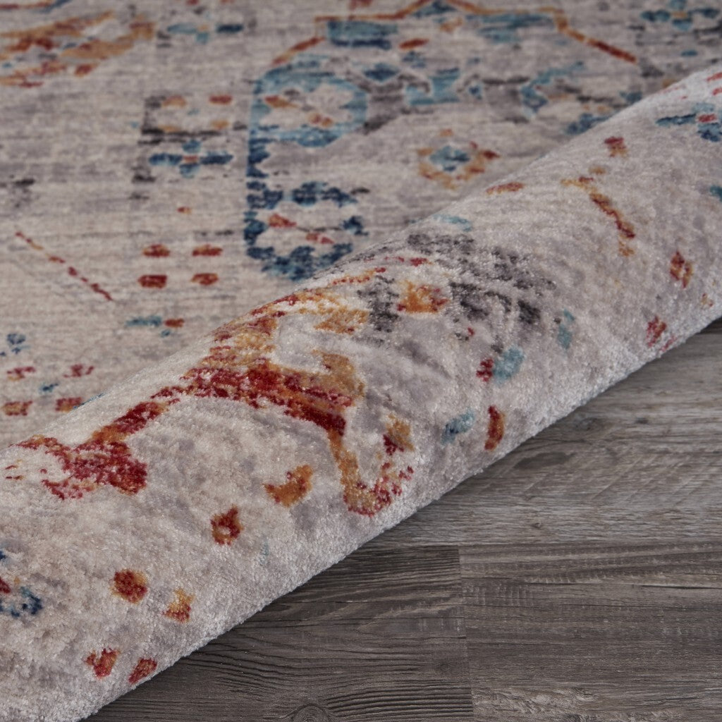 5' x 8' Ivory Distressed Floral Area Rug